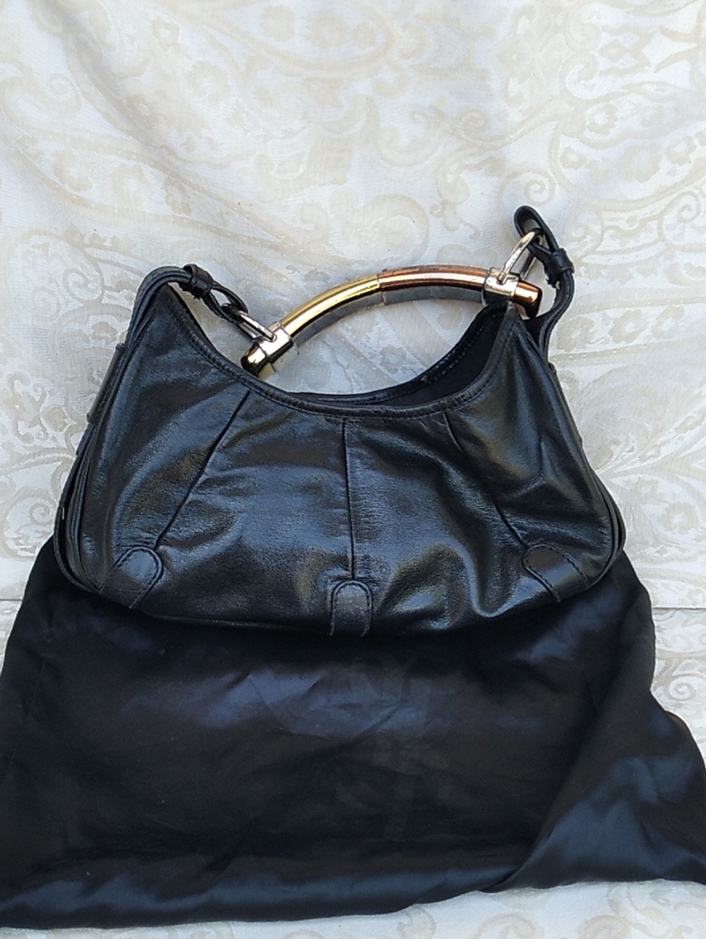 Yves Saint Laurent Mombasa Small Hobo Bag.